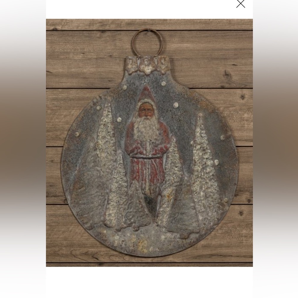Ragon House snowy Santa metal wall hanging.